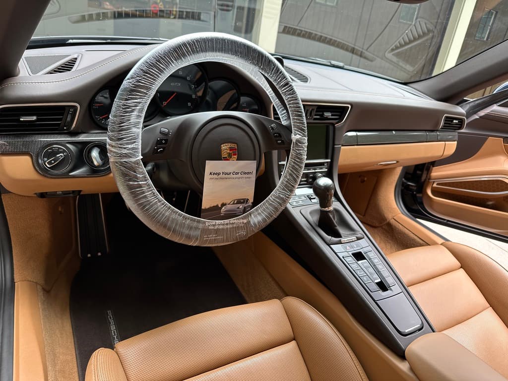 You Don't Need a Detailing Business Coach. You Need a System With Skin in the Game.